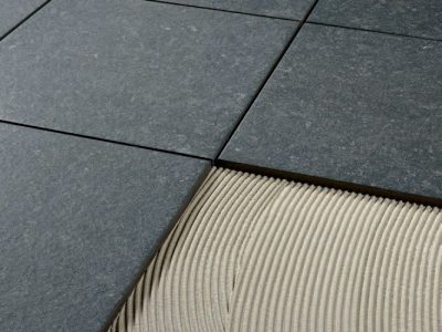 Grouts and adhesives