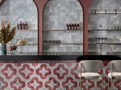 Vibrant and pattern ceramic tiles used in a commercial restaurant and bar area.