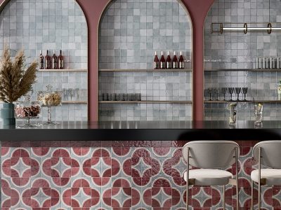 Vibrant and pattern ceramic tiles used in a commercial restaurant and bar area.